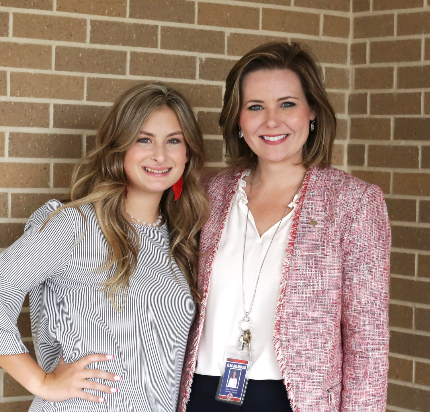 Alba-Golden secondary school student of the month senior Cassidy Burris is photographed with high school principal Macie Thompson.